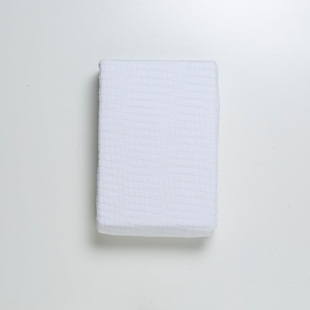 Coprimaterasso Elasticizzato in Spugna Jacquard con Angoli Disegno Quadretti